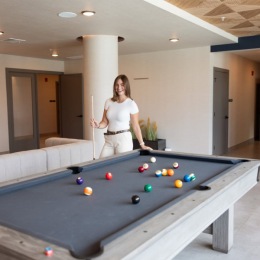 a person playing pool